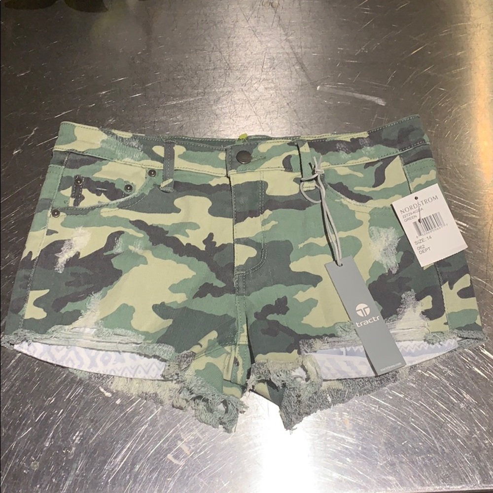Green camo design jean shorts from Tractr girls.
